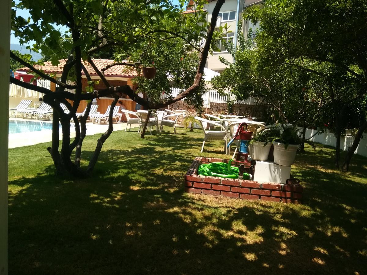 Grandma'S Garden Aparthotel Далян Екстериор снимка